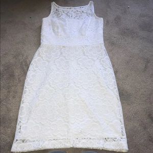 Women’s white floral dress.